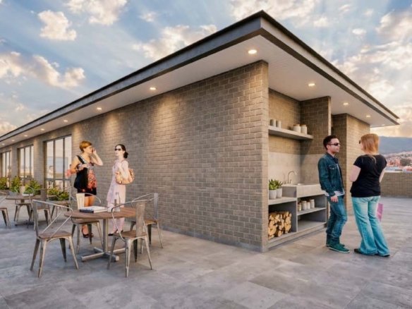 Terraza comunal con zona de asador en el último piso de Riviere
