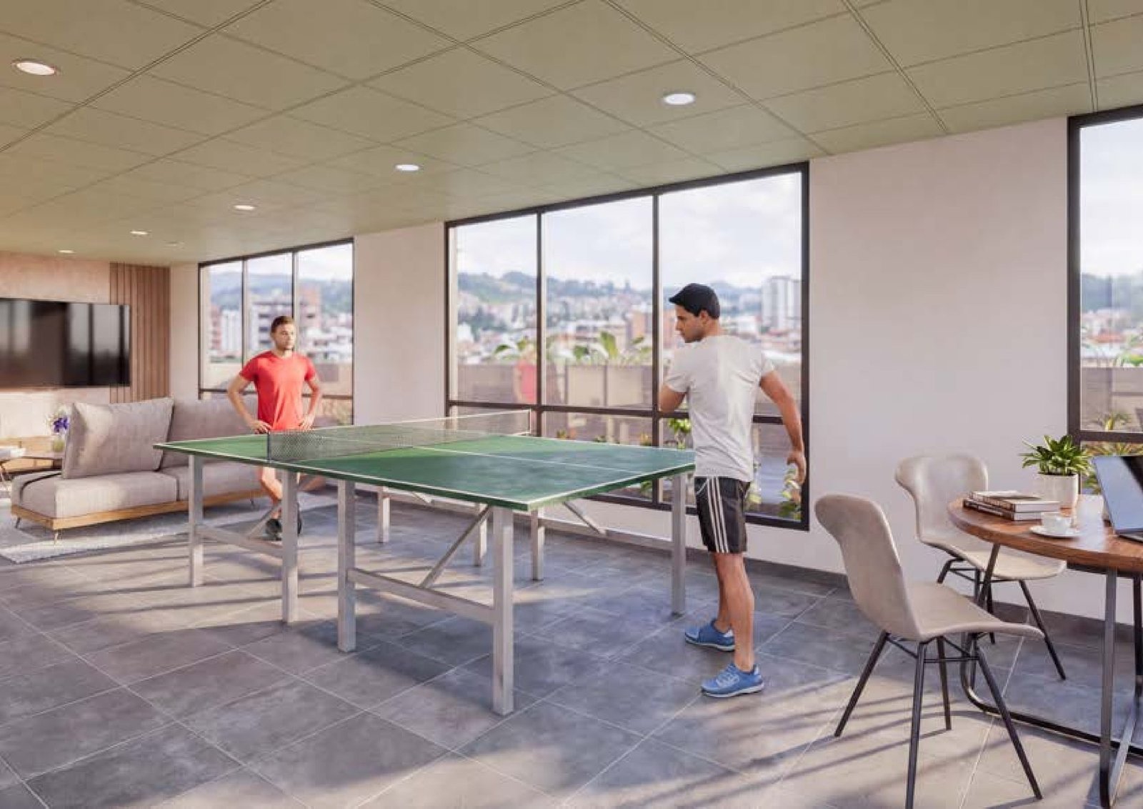 Sala de juegos con mesa de ping pong en Riviere
