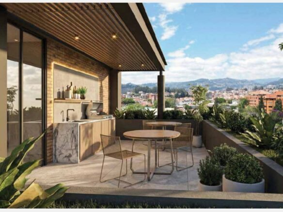 Terraza comunal con asador y vista a Cuenca en AMAYO
